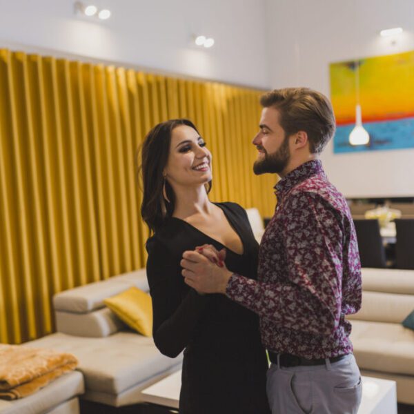 romantic-couple-dancing-home-scaled-e1754915374357